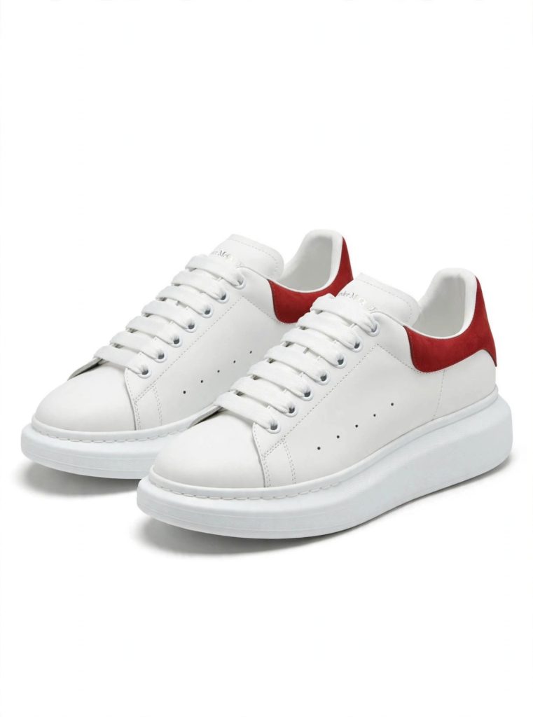 Alexander McQueen Oversized Sneaker — White/Red Suede Heel for sale — standing shot